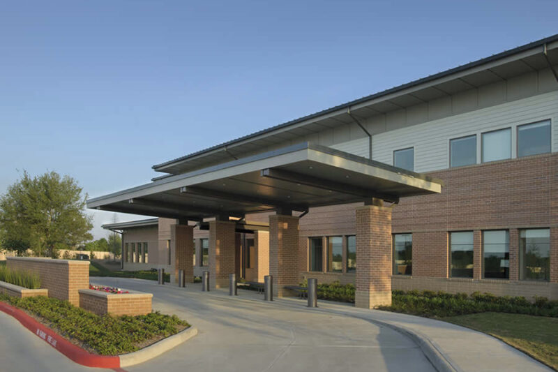 Covered entrance to the Commons Building at The Menninger Clinic in Houston