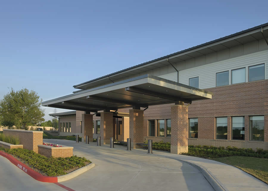 Covered entrance to the Commons Building at The Menninger Clinic in Houston