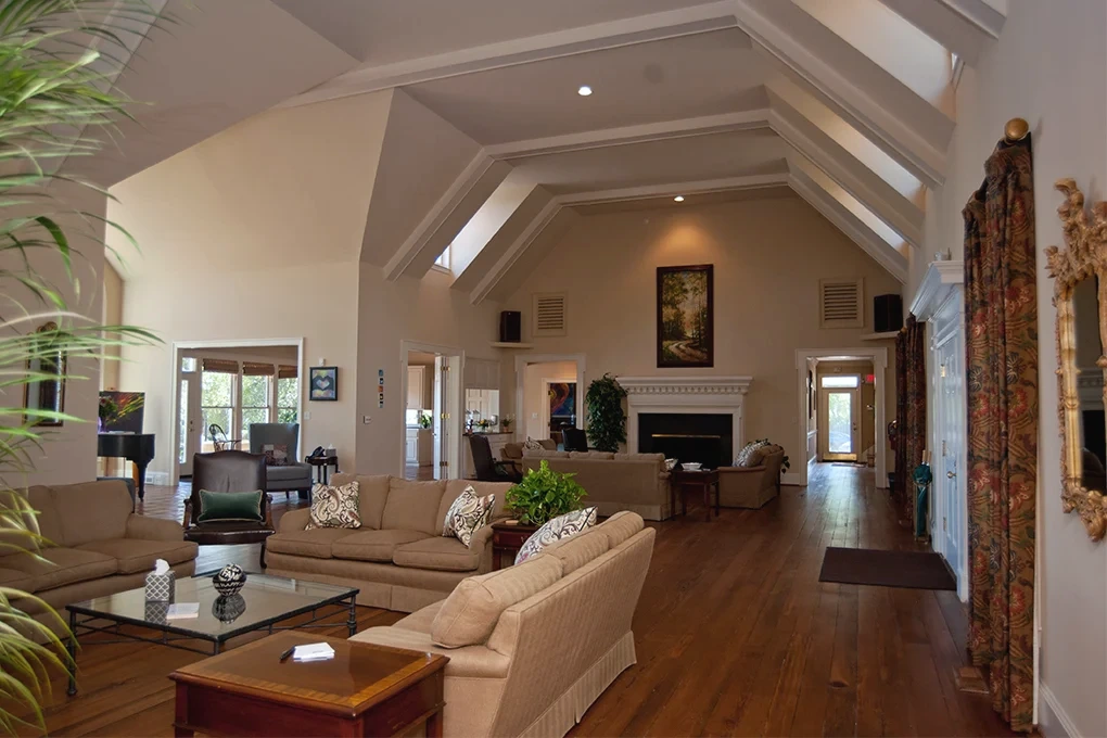 Shared lounge with sofas and a fireplace at Bluff in Augusta, Georgia