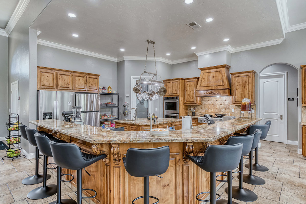 Kitchen and breakfast counter at First Steps Recovery's Oak men's residence in Clovis