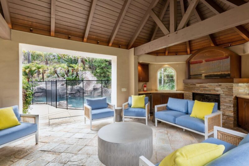 Covered poolside lounge at a Newport Academy Southern California residential campus