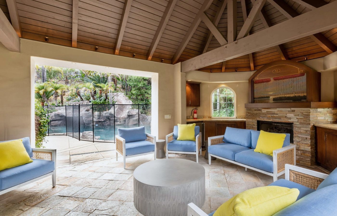 Covered poolside lounge at a Newport Academy Southern California residential campus