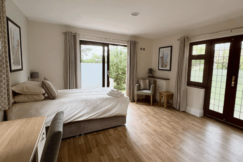 Premium bedroom at Priory Eden House residential addiction service in Mill Hill, London
