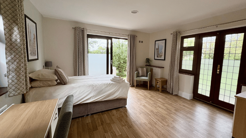 Premium bedroom at Priory Eden House residential addiction service in Mill Hill, London