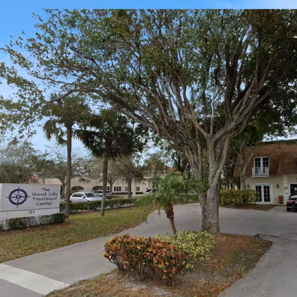 Entrance sign and grounds at The Good Life Treatment Center in North Palm Beach, Florida
