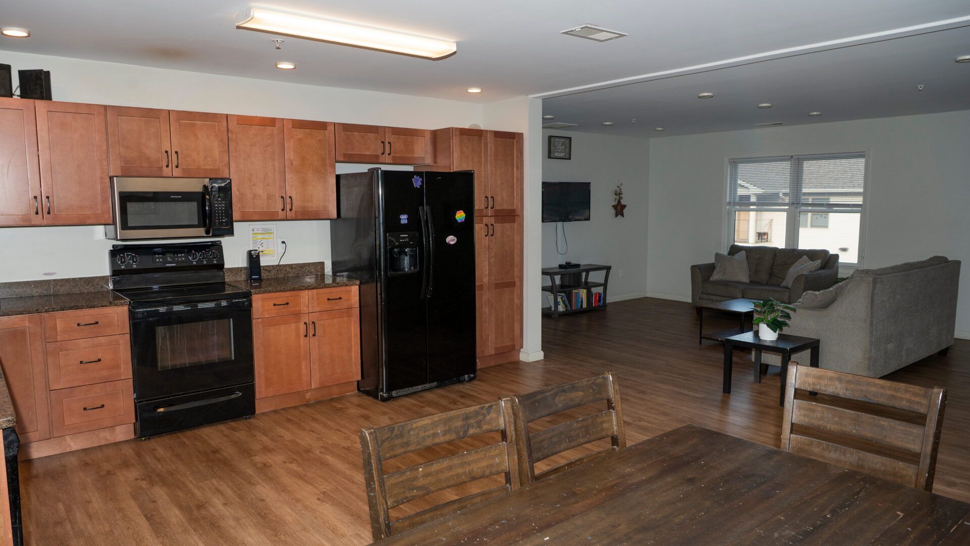 Open-plan kitchen and lounge at Crest View Recovery Center in Asheville