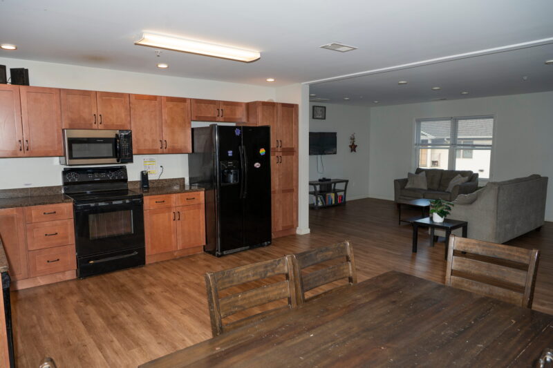Open-plan kitchen and lounge at Crest View Recovery Center in Asheville
