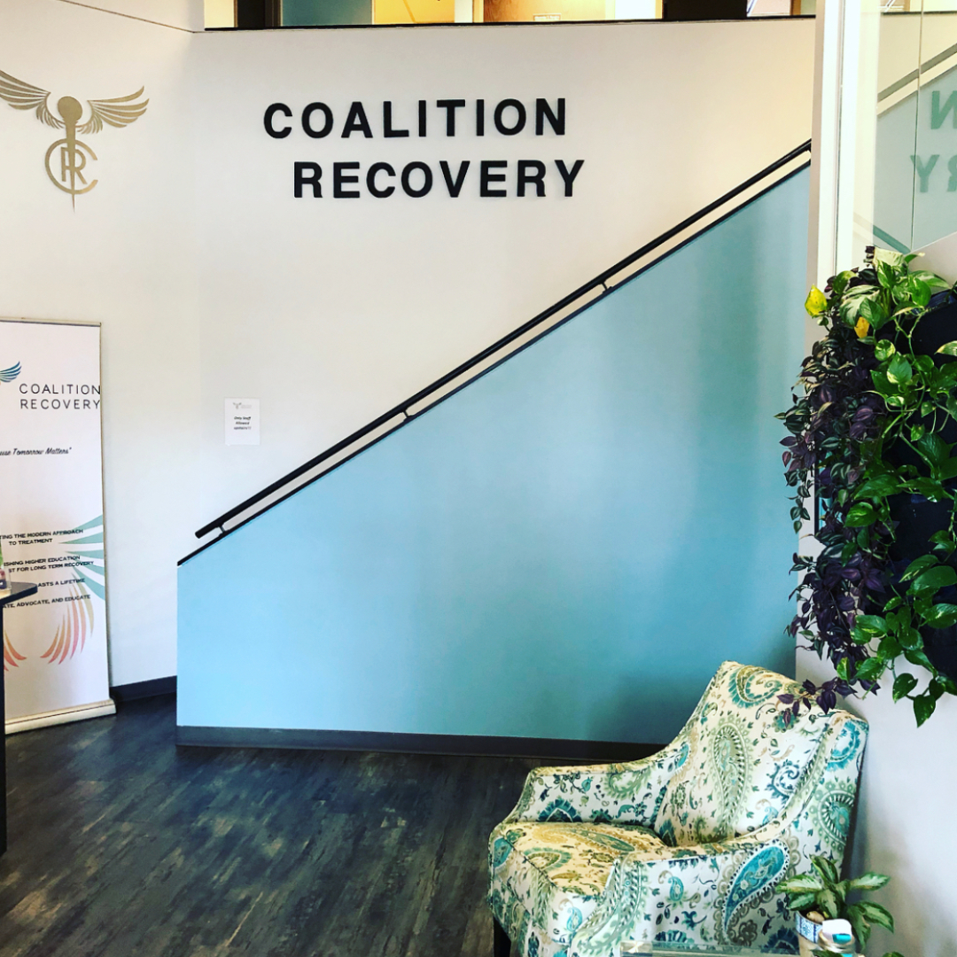 Branded reception area at Coalition Recovery’s Tampa treatment facility