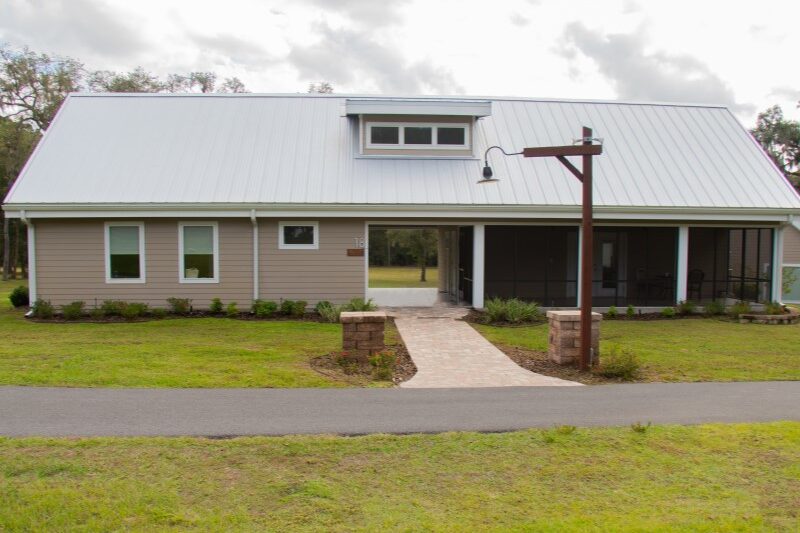 Cabin exterior and walking path at The Refuge in Ocala National Forest