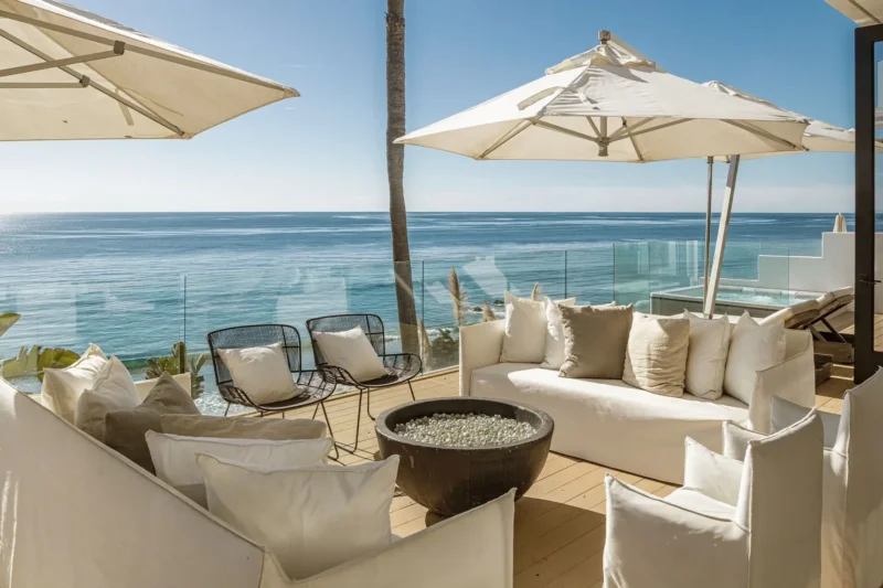 Oceanfront patio at Carrara Treatment’s Malibu Beach House