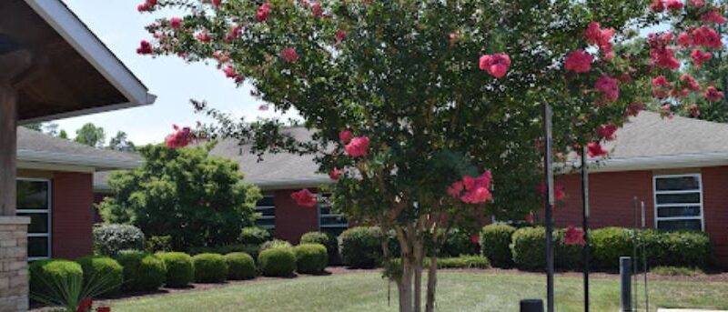 Landscaped courtyard at Raleigh Oaks Behavioral Health in Garner, North Carolina
