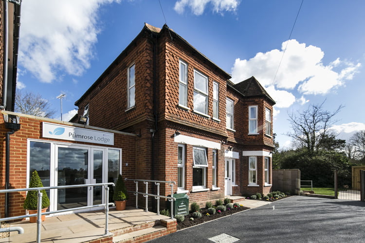 Signed entrance and exterior of UKAT’s Primrose Lodge treatment centre