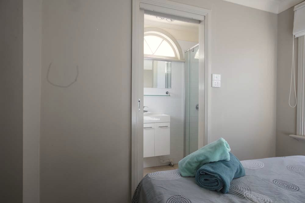 En-suite bedroom at Arrow Health's Bentinck residential program in Victoria
