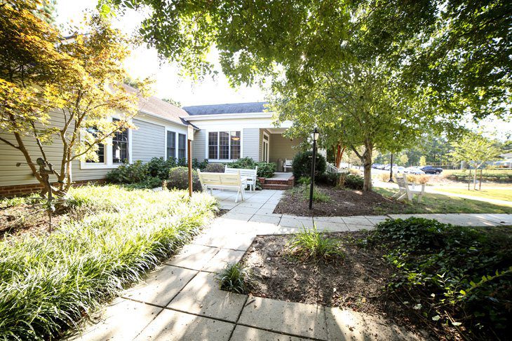 Landscaped courtyard at the Farley Center residential campus in Williamsburg, Virginia