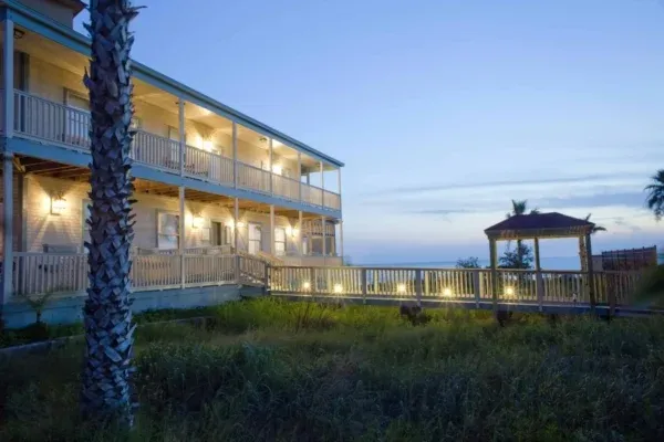 Exterior of Hannah's House by Origins on South Padre Island at night