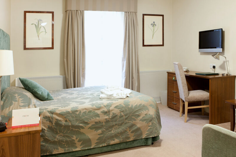 Bright private bedroom at Priory Hospital North London