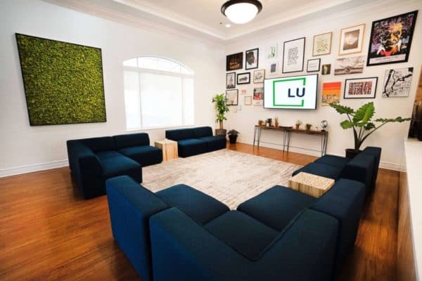 Branded group living area at a We Level Up Florida treatment facility