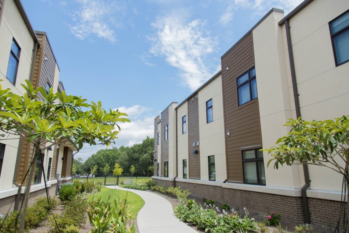 Walking path and garden between buildings at Wilmington Treatment Center