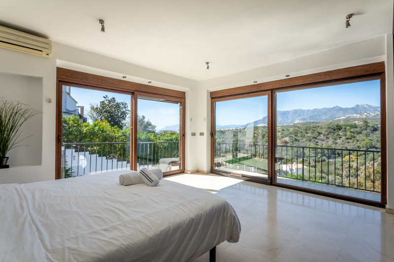 Bedroom overlooking the hills at The Bridge Marbella villa