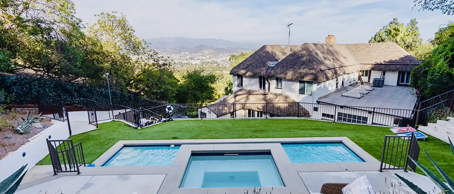 Pool and landscaped terrace beside the Luxe Recovery LA residence