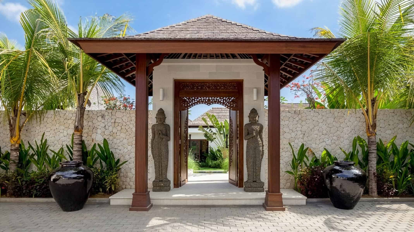Private villa entrance with tropical planting, shown on the Istana Private website