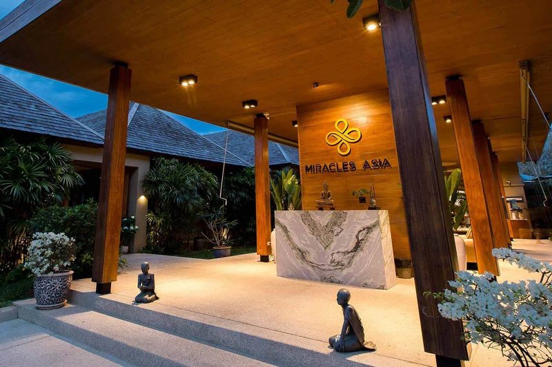 Illuminated reception pavilion and entrance at Miracles Asia in Phuket