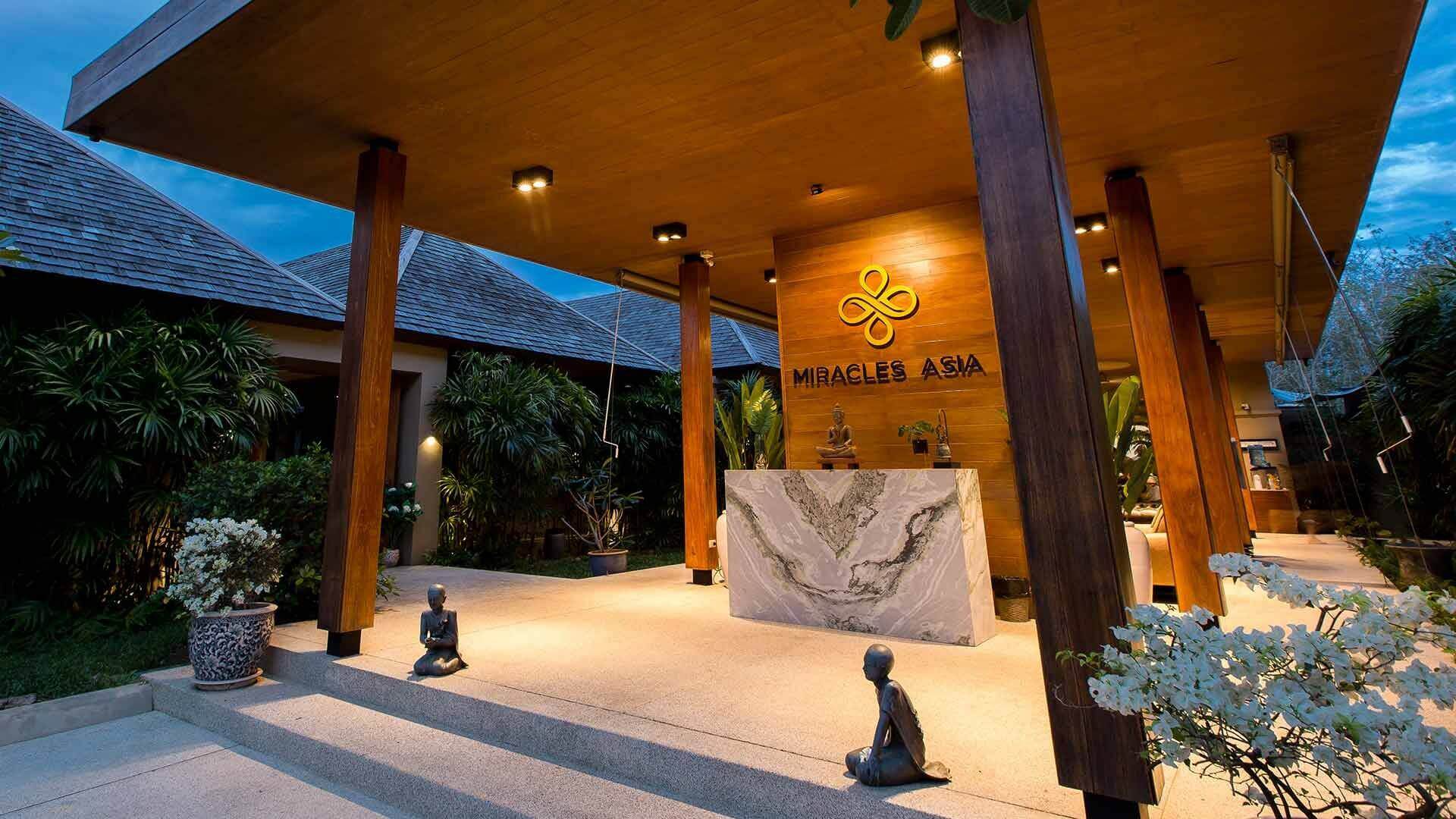 Illuminated reception pavilion and entrance at Miracles Asia in Phuket