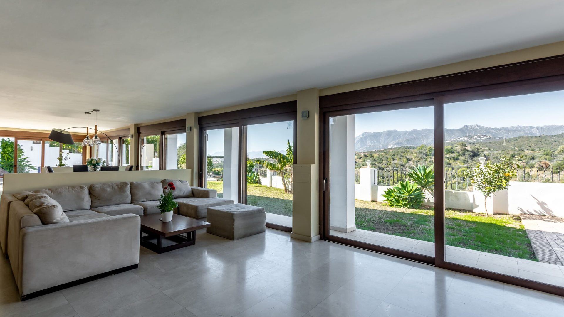 Lounge and garden views at The Bridge Marbella