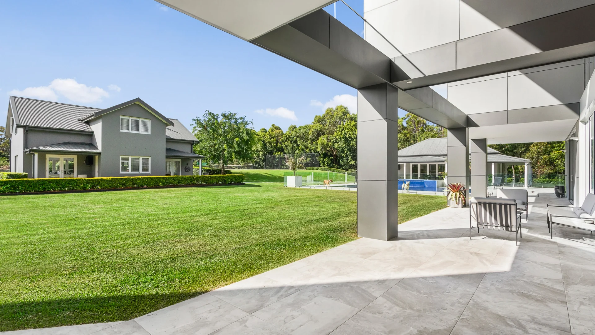 Tranquilo Wellness residence and landscaped grounds viewed from the covered terrace
