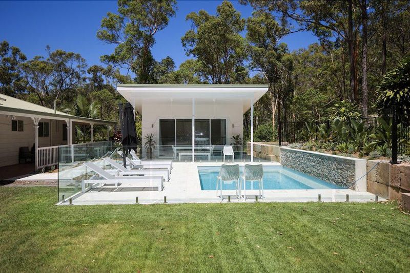 Pool and white pavilion at The Bardo’s Queensland retreat