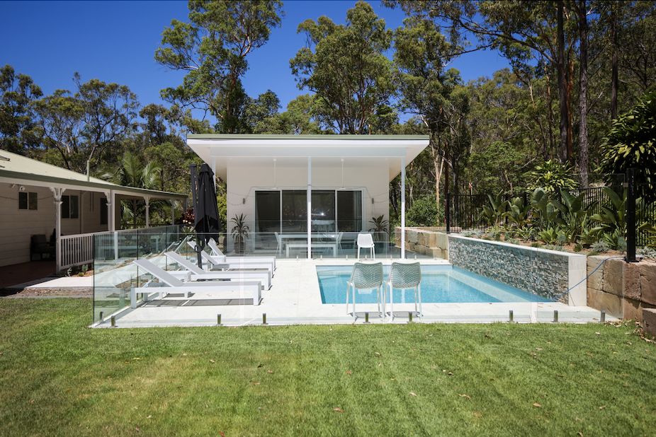 Pool and white pavilion at The Bardo’s Queensland retreat